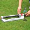 imageEden 96213 Lawn ampamp Garden Essential Oscillating Sprinkler  Water Sprinkler for YardCovers up to 3600 sq ft Heavy Weight Base20 Nozzles Metal with Flow and Range Control